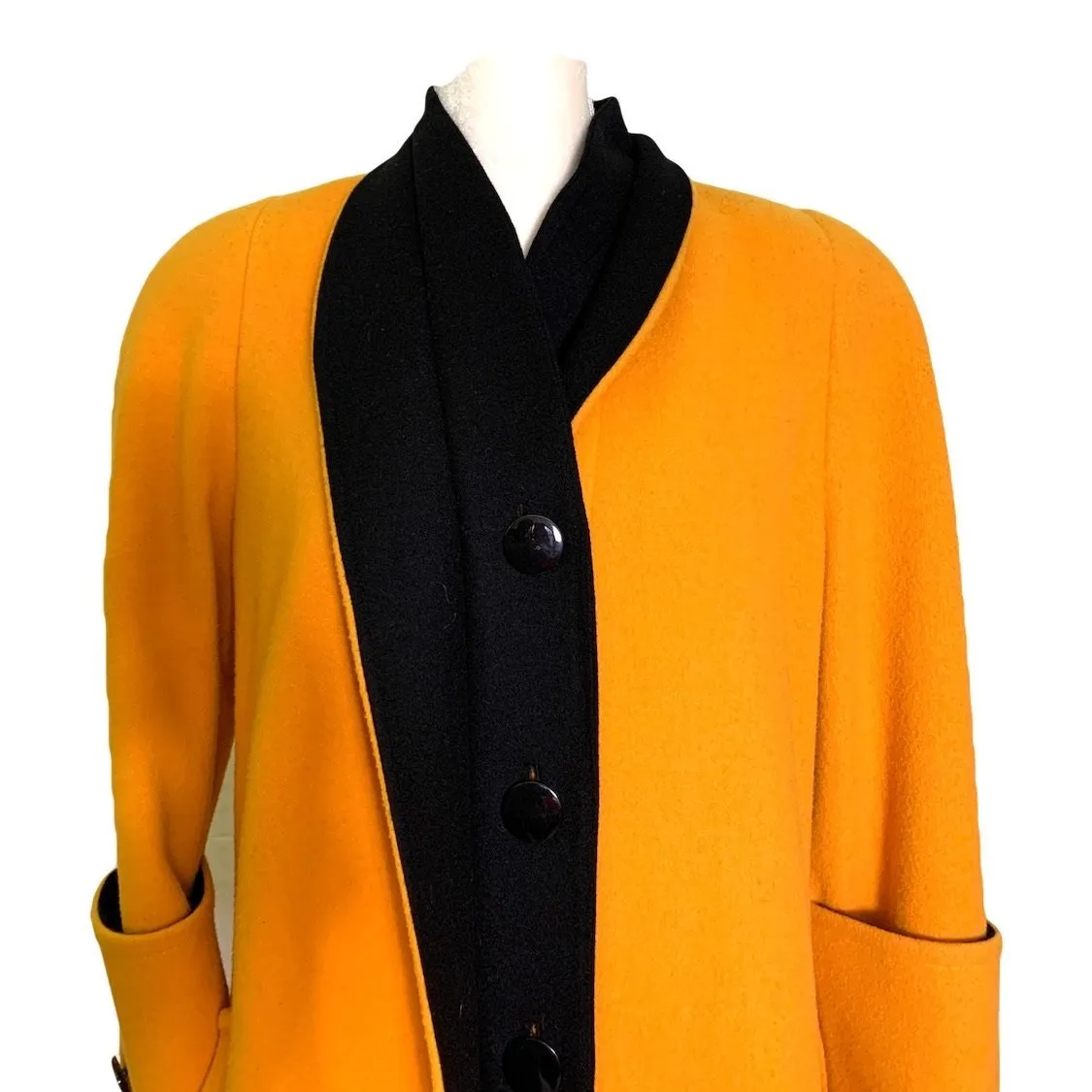 1980s Yellow Wool Coat by Ilie Wacs. Bold and Oversized with Black Collar and Button Accents.