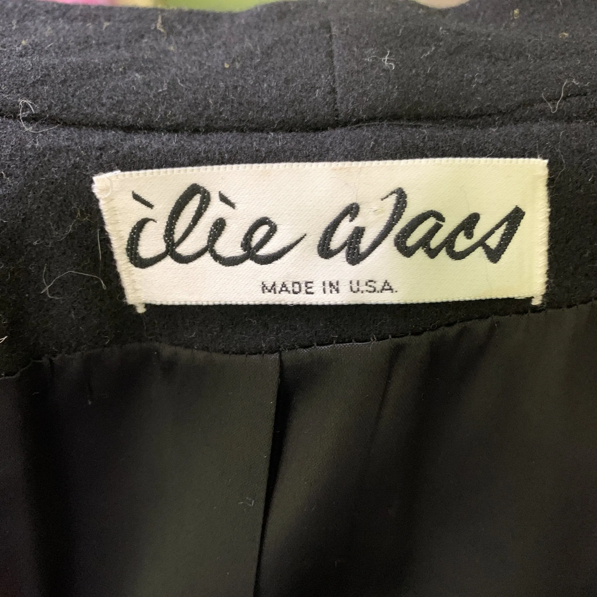 1980s Yellow Wool Coat by Ilie Wacs. Bold and Oversized with Black Collar and Button Accents.